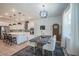 Elegant dining area adjacent to the kitchen, featuring modern lighting and stylish decor at 14146 Samoa Hill Ct, Riverview, FL 33569
