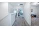 Upstairs hallway with carpet flooring and ample lighting at 14146 Samoa Hill Ct, Riverview, FL 33569
