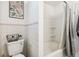 Clean bathroom offering a toilet, bathtub, and shower combination at 16044 Stur St, Brooksville, FL 34604