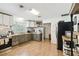 Well-equipped kitchen with stainless steel appliances and stylish cabinets at 16044 Stur St, Brooksville, FL 34604