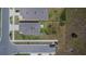 An aerial shot of the homes showing the backyard layouts in the residential community at 16894 Delia St, Wimauma, FL 33598