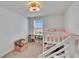 Charming bedroom featuring a unique bunk bed with a window view at 16894 Delia St, Wimauma, FL 33598