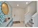 Inviting foyer with stylish decor, tiled flooring, and a staircase to the upper level at 16894 Delia St, Wimauma, FL 33598