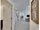 Spacious hallway offering a seamless transition between rooms at 16894 Delia St, Wimauma, FL 33598