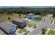 View of an attractive residential neighborhood offering well-maintained lawns and tree-lined streets at 16894 Delia St, Wimauma, FL 33598