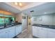 Kitchen with stainless steel sink, dishwasher, and granite countertops at 1806 Mariner Dr # 112, Tarpon Springs, FL 34689