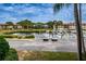 Scenic view of the marina from the property, showcasing boat slips and waterfront living at 1806 Mariner Dr # 112, Tarpon Springs, FL 34689