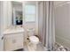 Bright bathroom features a modern vanity, white subway tile, and shower-tub combo at 19475 Bristol Wood Pl, Brooksville, FL 34601