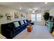 Bonus room featuring a couch, window views, shelving with decorations and recessed lighting at 19475 Bristol Wood Pl, Brooksville, FL 34601