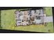 Floor plan view, showing the layout, furniture, and landscaping of the house at 19475 Bristol Wood Pl, Brooksville, FL 34601