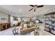 Spacious layout showcasing the open-concept living room, dining space, and modern kitchen design at 19475 Bristol Wood Pl, Brooksville, FL 34601