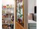 Walk-in pantry door with stained glass, offering ample storage space at 19475 Bristol Wood Pl, Brooksville, FL 34601