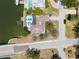 Single story house with screened pool, dock and boat lift in a waterfront neighborhood at 2001 Iowa Ne Ave, St Petersburg, FL 33703