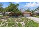 Charming single-story home featuring a two-car garage and tile roof at 2001 Iowa Ne Ave, St Petersburg, FL 33703
