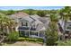 Beautiful home with manicured landscaping, complemented by mature trees, offering privacy and curb appeal at 20113 Bending Creek Pl, Tampa, FL 33647