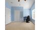 Bedroom featuring carpet floors, natural light, a ceiling fan, closet, and pale blue walls at 20113 Bending Creek Pl, Tampa, FL 33647