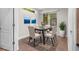 Dining room featuring a modern table and chairs set over an area rug at 20113 Bending Creek Pl, Tampa, FL 33647