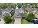 Well-maintained home featuring a two-car garage, neat landscaping, and a cozy screened porch at 20113 Bending Creek Pl, Tampa, FL 33647