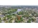 Panoramic aerial view of home situated in a charming neighborhood close to a picturesque river at 2106 W Saint Isabel St, Tampa, FL 33607