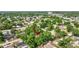 Aerial view of a lovely home surrounded by mature trees in a serene residential setting at 2106 W Saint Isabel St, Tampa, FL 33607