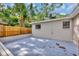 Spacious back patio area with privacy fence, perfect for outdoor entertaining at 2106 W Saint Isabel St, Tampa, FL 33607