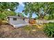 Expansive backyard with deck, patio, and outdoor gazebo, great for entertaining at 2106 W Saint Isabel St, Tampa, FL 33607