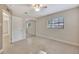 Bedroom with mirrored closet doors, and tile floors at 2106 W Saint Isabel St, Tampa, FL 33607