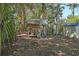Spacious backyard features a wooden shed and storage shed offering a serene outdoor space at 249 41St Ne Ave, St Petersburg, FL 33703