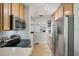 Well-equipped kitchen featuring modern appliances and ample cabinet space at 249 41St Ne Ave, St Petersburg, FL 33703