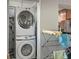 Modern laundry area equipped with stacked washer and dryer at 249 41St Ne Ave, St Petersburg, FL 33703