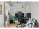 Home office setup featuring a desk with multiple monitors, a comfortable chair, and modern decor at 249 41St Ne Ave, St Petersburg, FL 33703