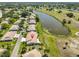 Aerial view showcasing the home's location with waterfront views at 2509 Locksley St # 237, Sun City Center, FL 33573