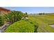 Well-maintained landscaping and lush greenery enhance the backyard's appeal at 2509 Locksley St # 237, Sun City Center, FL 33573