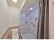 Clean bathroom featuring tiled shower and toilet with modern fixtures at 2509 Locksley St # 237, Sun City Center, FL 33573