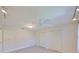 Bright bedroom features tiled floor, track lights, ceiling fan and spacious double closets at 2509 Locksley St # 237, Sun City Center, FL 33573