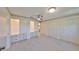 Large bedroom features tile floors, built-in closets and draws, and modern ceiling fan at 2509 Locksley St # 237, Sun City Center, FL 33573