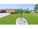 Charming single-story home with a well-manicured lawn and lush landscaping at 2509 Locksley St # 237, Sun City Center, FL 33573