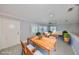 Inviting living area with wood furnishings, white shutters and bright natural light at 2509 Locksley St # 237, Sun City Center, FL 33573