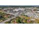 Aerial view of community next to a thoroughfare, with proximity to shopping and services at 2693 Sabal Springs Cir # 206, Clearwater, FL 33761