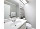 Clean bathroom featuring a vanity with sink, toilet and accessories at 2693 Sabal Springs Cir # 206, Clearwater, FL 33761