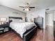 Cozy bedroom featuring wood flooring, neutral paint, and offering a serene retreat at 2693 Sabal Springs Cir # 206, Clearwater, FL 33761