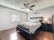 Beautiful primary bedroom offering wood floors, ceiling fan, and a serene ambiance at 2693 Sabal Springs Cir # 206, Clearwater, FL 33761