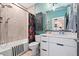 Well-lit bathroom featuring modern fixtures, bathtub and shower combo at 2810 N Florida Ave, Tampa, FL 33602
