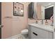 Elegant powder room featuring modern fixtures, stylish decor, and sleek vanity, offering sophisticated comfort at 2810 N Florida Ave, Tampa, FL 33602