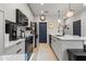 Contemporary kitchen design with white cabinets, modern appliances, and sleek countertops for efficient cooking at 2810 N Florida Ave, Tampa, FL 33602