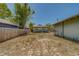 Wide backyard view, showing a wooden fence offering privacy and potential for landscaping or recreation at 2835 Dartmouth N Ave, St Petersburg, FL 33713