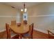 Charming dining room with wood table, perfect for Gathering gatherings and meals at 2835 Dartmouth N Ave, St Petersburg, FL 33713