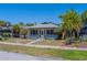 Charming home with a screened-in porch and landscaped front yard, perfect for relaxing outdoors at 2835 Dartmouth N Ave, St Petersburg, FL 33713