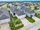 A well-planned community with homes featuring spacious driveways, fenced yards, and lush greenery, providing comfort and privacy at 28680 Cozy Creek Dr, Wesley Chapel, FL 33543