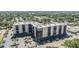 Aerial view of multi-Gathering apartment building with balconies and parking areas at 2901 26Th W St # 317, Bradenton, FL 34205